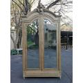 A 19TH Century French Rococo Armoire in a Bleached Contemporary Finish with Bevelled Mirrors