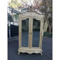 A 19th Century French Rococo Armoire In A Contemporary Bleached Finish With Bevelled Mirrors