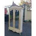 A 19th Century French Rococo Armoire In A Contemporary Bleached Finish With Bevelled Mirrors