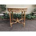 A French Style Ornately Carved Marble top Centre Table