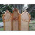 A 2Oth Century French Rococo Style Ornately Carved and Gilded Rattan Screen