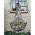 A French Empire Style Brass Gilt Chandelier