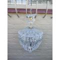 A French Style Brass and Crystal Plate Chandelier with Floral Top