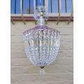 A French Style Brass and Crystal Plate Chandelier with a Floral Cerise Top