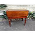 An Antique 19h Century Burmese Teak Drop-Side Table With Drawer