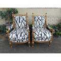 A Pair Of 20th Century Carved Wooden And Gilt-Painted Armchairs