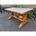 A 20th Century Carved and Giltwood Table with Marble Top