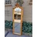 An Ornate Rococo French Style Carved Bevelled Mirror