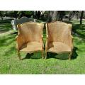 A 20th Century Pair of French Style Rattan Hand Gilded Wing Back Chairs