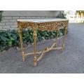 A 20th Century Ornately Carved And Hand-Gilded Console Table With Marble Top