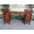 A George III Circa 1820 Mahogany / Flame Mahogany With Parcel Gild Sideboard With Two Cellarette ...