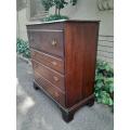 An Antique George III Provincial Oak Chest Of Drawers On Bracket Feet