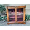 A Victorian Walnut Credenza / Display Cabinet With Gilt Mounts And Glazed Doors With Shelves On B...