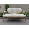 A 20th Century French Gilt Wood Settee