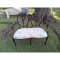 A Victorian Circa 1890 Carved Mahogany Settee Upholstered in a Custom Made Script Linen for The...
