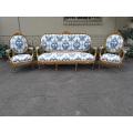 A 20TH Century French Louis XVI Style Set Of A Carved And Gilded Settee And Pair Of Armchairs