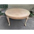 A 20th Century Heavily Carved Round Table in a Contemporary Bleached Finish with Bevelled Mirro...
