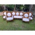 A 20th Century French Louis XVI Style Five Piece Set of Giltwood Settee and Four Armchairs
