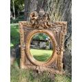 A French Rococo Style Ornately Carved and Gilded Bevelled Mirror 3