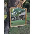 A French Rococo Style Ornately Carved and Gilded Bevelled Mirror 6