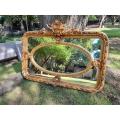 A French Style Ornately Carved and Gilded Bevelled Mirror 1