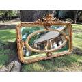A French Style Ornately Carved and Gilded Bevelled Mirror 1