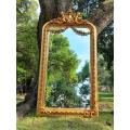 A French Style Ornately Carved and Gilded Bevelled Mirror 3