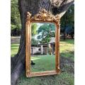 A French Style Ornately Carved and Gilded Bevelled Mirror 4