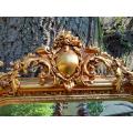 A French Style Ornately Carved and Gilded Bevelled Mirror 4