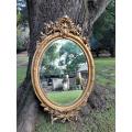 A French Style Ornately Carved and Gilded Bevelled Mirror 8
