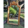 A French Style Ornately Carved and Gilded Bevelled Mirror 9