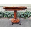 A 19TH Century William IV Rosewood Fold-over Card Table With Paw Feet