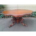 An Antique Victorian Rare Burr Walnut Scalloped Folding Breakfast Table with Heavily Carved Base