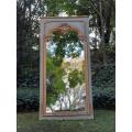 A 20TH Century French Style Carved, Gilded and Painted Mirror of Large Proportion