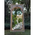 A 20TH Century French Style Carved, Gilded and Painted Mirror of Large Proportion