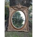 A French Rococo Style Ornately Carved and Gilded Bevelled Mirror 10