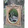A French Rococo Style Ornately Carved and Gilded Bevelled Mirror 10
