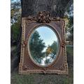 A French Rococo Style Ornately Carved and Gilded Bevelled Mirror 9