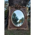 A French Rococo Style Ornately Carved and Gilded Bevelled Mirror 9
