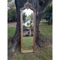 A French Rococo Style Ornately Carved and Gilded Bevelled Mirror 8