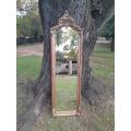 A French Rococo Style Ornately Carved and Gilded Bevelled Mirror 8