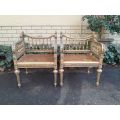 A 20th Century French Style Pair of Ornately Carved and Rattan Arm Chairs