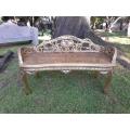 A French Style Ornately Carved and Hand- Gilded Rattan Bench / Settee