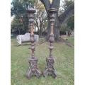 A Pair of French Style Carved and Gilded Floor or Table Candle Holders