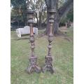 A Pair of French Style Carved and Gilded Floor or Table Candle Holders