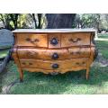 A 20th Century French Style Large Ornate Bombe Chest of Drawers with Cream Marble Top and Bra...