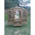 A 20th Century French Style Three Division and Large Ornately Carved and Hand-Gilded Display Cabinet