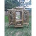 A 20th Century French Style Three Division and Large Ornately Carved and Hand-Gilded Display Cabinet