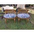 A Pair of French Style Ornately Carved & Gilded Slipper Chairs