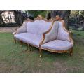 A 20th Century French Style Gilt Wood Large Conversation Settee